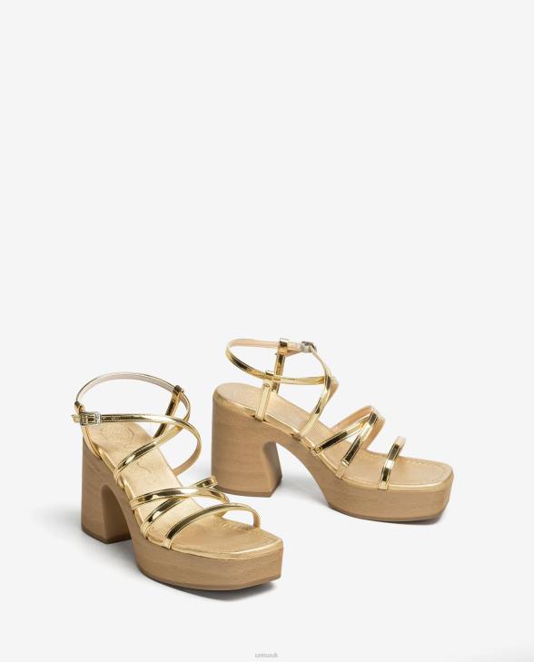 Women Unisa Sandal with a block heel and thin straps Gold0X8N237