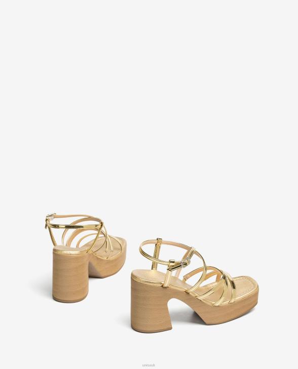 Women Unisa Sandal with a block heel and thin straps Gold0X8N237