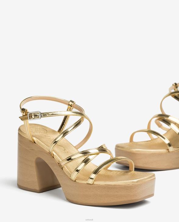 Women Unisa Sandal with a block heel and thin straps Gold0X8N237